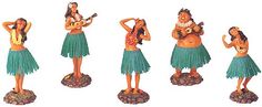 four figurines of three women in grass skirts and hula skirt, one holding a guitar