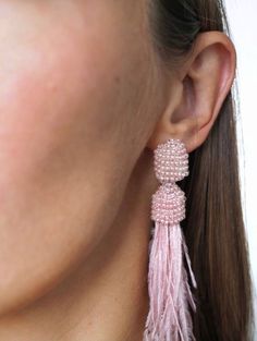 Beautiful Handcrafted Feather Earrings - Boho Style! 🌸 Looking for a statement piece to elevate your style? Our exquisite collection of women's earrings is here to dazzle you! These handcrafted feather earrings are a perfect blend of elegance and boho chic. 💫✨ 👑 Key Features: * Long Feather Earrings: These stunning earrings feature delicate feathers that dangle gracefully, adding a touch of whimsy to your look. * Feather Charms: The intricately designed feather charms make these earrings truly unique and eye-catching, perfect for any occasion. * Beaded Elegance: Each earring is adorned with meticulously handcrafted beads, adding a subtle sparkle and elegance to your ensemble. * Versatile Jewelry: Suitable for both everyday wear and special occasions, these earrings effortlessly compleme Cheap Pink Elegant Tassel Earrings, Elegant Dangle Earrings With Feathers, Pink Elegant Tassel Earrings, Trendy Feather Earrings, Pink Feather Earrings, Festival Earrings, Versatile Jewelry, Pink Feathers, Feather Charms