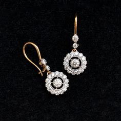 A stunning diamond dangle earrings are a perfect pair for your big day! With over a quarter carat of diamonds, these earrings sport a 0.10ct diamond in the center with a scalloped diamond halo which dangles beautifully from 2 diamonds! The ear wire is comfortable and can be locked for a secure fit! * Diamond Wt. : 0.85 Cts * Color-Clarity Grade : H-I, Vs-Si * Gold - 14K, 3 gms solid gold These earrings come in a lovely gift box with EGL certification. Find us on Instagram for exquisite designs: Formal Dazzling Diamond Earrings With Single Cut Diamonds, Diamond Drop Earrings For Wedding, Wedding Drop Diamond Earrings, Fine Jewelry Brilliant Cut Dangle Earrings, Fine Jewelry Earrings With Brilliant Cut Dangle, Fine Jewelry Dangle Earrings With Brilliant Cut, Exquisite Diamond Bridal Earrings With Halo Design, Timeless Formal Earrings With Single Cut Diamonds, Wedding Diamond Drop Earrings