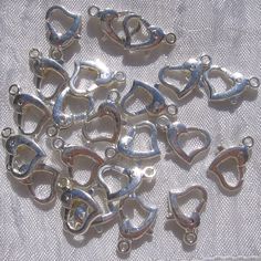 Lobster clasps, 4 clasps, heart clasps, 14x9mm clasp, silver lobster clasp, for chain necklace bracelet, jewelry creation, M4 Set of 4 silver leaf whitened lobster clasps Shape: Heart Color: light silver Dimensions: 14x9mm Number of carabiners in a set: 4 pieces Compatible rings are sold in the shop under ref A56 (5mm), A55 (4mm) For your costume jewelry: bracelets, necklaces, chains, etc. Don't forget to look at our other items for sale. You may find your "rare pearl" there. Lots of beads, find Rare Pearls, Bar Items, Bracelet Jewelry, Jewelry Creation, Silver Leaf, Necklace Bracelet, Wedding Shop, Color Light, Favorite Things List