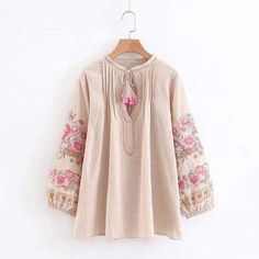 Product Details: Linen/Cotton Three quarter sleeve Tassel feature Floral pattern V-neck Lantern sleeve Tassel Shirt, Outfits Ideas For Summer, Knit Dress Pattern, Shirt Dress Pattern, Beach Floral, Bohemian Blouses, Boho Shirts, Shirt Embroidery, Loose Outfit