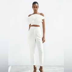 Zara High-Waisted Pants Saize Xs Color White High Waisted Pants With Pronounced Seams At Front And Back. Front Welt Pockets. Front Zip, Metal Hook, And Inside Button Closure. 7102/562 White Cropped Bottoms For Party, Cropped White Party Bottoms, Chic White Pants For Night Out, White High Waist Pants For Night Out, High Waist White Pants For Night Out, Chic Fitted Cropped Bottoms, Chic Cropped Fitted Bottoms, Elegant Cropped Bottoms For Summer, Chic White Tapered Leg Bottoms