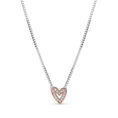 Pandora's freehand heart symbolizes "perfectly imperfect" love. This necklace with a heart pendant allows you to wear the freehand heart so that it really comes into its own, as a fresh take on the classic heart motif. Hand-finished in sterling silver and 14K rose gold plating, the necklace is adorned with brilliant-cut clear cubic zirconia and perfect for layering, so wear yours in twos or threes, or mix it with your existing necklaces. Pandora Rose, Heart Motif, Cz Necklace, Perfectly Imperfect, Pandora Jewelry, Gold Plating, A Heart, Heart Pendant, The Necklace