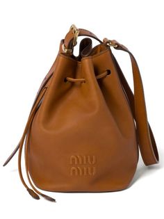 Miu Miu logo-embossed Leather Bucket Bag - Farfetch Bag Wishlist, Chanel 2, Demi Fine Jewelry, Leather Bucket Bag, Leather Bucket, Van Cleef Arpels, Fine Earrings, Ballet Flat Shoes, Embossed Logo