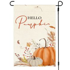 a garden flag with the words hello pumpkin on it