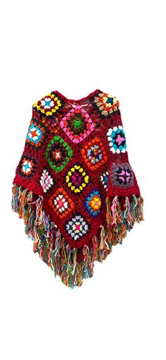 a red crocheted shawl with multicolored flowers and fringes on it