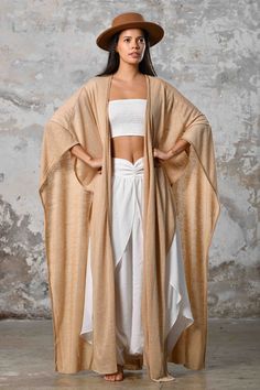 SAHMERAN Kimono Zhenabia, Image Oversized Wrap Kaftan For Festival, Oversized Wrap Kaftan For Beach Cover-up, Bohemian Spring Wrap Shrug, Wrap Kaftan For Festivals, One Size Wrap Kaftan For Festival, One Size Wrap Kaftan, Long Beige Kimono For Festival, Traditional Shawl Kimono For Summer, Beige Long Kimono For Festival