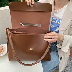 Material: PU Texture: Soft Closed: Buckle Size: 12.6"L x 4.7"W x 8.7"H in; It is enough to hold daily stuffs including cell phones, sunglasses, wallet, key etc. Baldric: Adjustable shoulder strap Brown Large Capacity Phone Bag For Daily Use, Brown Large Capacity Phone Bag For Travel, Travel Phone Bag With Large Capacity, Casual Phone Bag With Cell Phone Pocket For Office, Brown Large Capacity Travel Phone Bag, Large Capacity Satchel Phone Bag For Travel, Everyday Satchel Laptop Bag With Cell Phone Pocket, Large Capacity Satchel Phone Bag For Daily Use, Versatile Satchel Phone Bag For Office