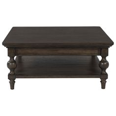 For those who appreciate a time-honored aesthetic with understated elegance, this coffee table brings home a timeless look. Its rich brown walnut finish merges seamlessly with a profiled top and traditional baluster turned legs for a richly classic appeal. And did we mention the spacious lower shelf to display your whatnots? | Ashley Veramond Coffee Table in Dark Brown | Wood | Nebraska Furniture Mart Dark Wood Coffee Table Living Room, Coffee Table Dark Wood, Dark Academia Coffee Table, Moody Coffee Table, Brown Square Coffee Table, Dark Coffee Table, Dark Brown Coffee Table, Wood Coffee Table Living Room, Square Wood Coffee Table