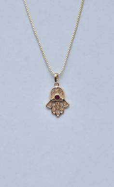 Hamsa Necklace Lucky Hamsa Necklace Gold Hamsa Necklace Inlaid Red Gemstone Fine Ruby Stone Necklace Fatima Hand Chain Spiritual Necklace Filigree Work Filigree Jewelry Gold Fatima Hand Jewelry Hamsa Jewelry Ruby stone jewelry Hamsa necklace made of high quality 21K gold filled A gift for a woman A gift for Valentine's Day A gift for an anniversary A gift for her A gift for a mother Red Gemstone Pendant Necklaces, Red Gemstone Pendant Necklace, Symbolic Red Pendant Jewelry, Spiritual Red Round Pendant Jewelry, Red Spiritual Round Pendant Jewelry, Red Amulet Style Round Pendant Jewelry, Red Amulet Pendant, Symbolic Red Jewelry As Gift, Red Amulet Pendant Necklace