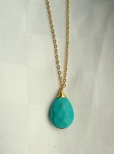 "Gold and turquoise necklace, Turquoise teardrop necklace, Gemstone necklace, December birthstone necklace A lovely faceted teardrop turquoise howlite pendant hangs elegantly from quality gold plated chain. Turquoise stones have their own unique markings and may differ slightly than the picture. The length of the necklace measures approximately 18\" (46cm) Every item from Gemma Jolee comes packaged ready for gift giving. Please contact me if you have any questions. Thanks for looking. To view ot Elegant Turquoise Charm Necklace For Gift, Elegant Turquoise Teardrop Pendant Necklace As Gift, Elegant Turquoise Teardrop Pendant Jewelry, Wire Wrapped Teardrop Pendant Necklace, Turquoise Teardrop Pendant Jewelry As Gift, Elegant Turquoise Charm Necklaces With Adjustable Chain, Turquoise Drop Jewelry As A Gift, Turquoise Drop Jewelry Gift, Elegant Turquoise Charm Necklace With Adjustable Chain