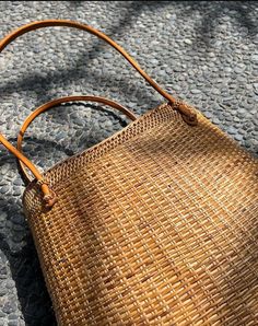 Experience the beauty of Bali with our artisanal rattan bag. Handmade with love, it's the perfect accessory for sun-soaked days and beach adventures. This stunning natural rattan bag is free shipping worldwide. The size of this rattan bag is approx 30 x 20 x 10 cm. Elevate your summer style to new heights with our exquisite rattan bag, beautifully crafted by artisans in the enchanting island of Bali. Each rattan bag is meticulously handmade with utmost care and attention to detail, resulting in Cowhide Rugs, Small Towel, Tropical Destinations, Rattan Bag, Beach Adventure, Hide Rug, Cow Hide Rug, Boho Living, Boho Living Room