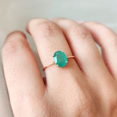 This stunning ring is set in 14k Solid Yellow Gold with Natural Emerald with utmost precision. It is an unique dainty gemstone ring for nearly every occasion and is completely hassle-free jewelry. 🔷GEMSTONE:  Emerald is often associated with love and romantic relationships. It is believed to promote love, loyalty, and unity, making it a popular choice for engagement and anniversary jewelry. Emerald is often associated with abundance and financial success. It is believed to attract prosperity an Emerald Oval Cabochon Ring As A Gift, Yellow Gold Emerald Ring, Oval Cabochon Gift, Oval Emerald Gemstone Ring Fine Jewelry, Yellow Gold Oval Cabochon Emerald Ring, Oval Cabochon Emerald Ring In Yellow Gold, Oval Solitaire Jewelry As A Gift, Oval Solitaire Jewelry Gift, Emerald Oval Cabochon Ring Gift, 14k Gold Oval Cabochon Emerald Ring Gift