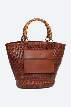 Maria Woven Leather Basket Bag in Cognac Brown Top Handle Shoulder Bag In Woven Leather, Brown Woven Leather Satchel For Daily Use, Leather Bucket Bag With Bamboo Handle For Shopping, Brown Woven Leather Top Handle Bag, Brown Woven Leather Bag With Top Handle, Brown Woven Leather Bag For Daily Use, Brown Woven Leather Shoulder Bag For Travel, Brown Woven Leather Rectangular Bag, Brown Rectangular Bag With Woven Leather