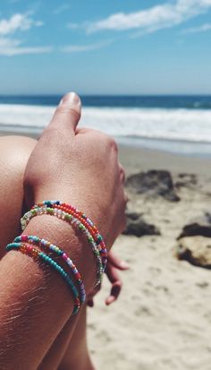 "These colorful bracelets are fun to mix and match!! Also make as a cute gift to share with a friend!  - Bracelets are 6.5 inches long and have a 1.5 inch extension chain Celebrate the beautiful friendships God has given you!! \" A sweet friendship refreshes the soul\" Proverbs 27:9" Trendy Heishi Beads Friendship Bracelets For Beach, Summer Heishi Beads Friendship Bracelets, Summer Friendship Heishi Beads Bracelets, Trendy Colorful Friendship Bracelets With Tiny Beads, Colorful Tiny Beads Friendship Bracelets, Colorful Friendship Bracelets With Beads, Casual Colorful Beaded Bracelets With Tiny Beads, Colorful Casual Beaded Bracelets With Tiny Beads, Trendy Beach Bracelets With Tiny Beads