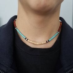 This choker is very comfortable to wear for beach days or every day. Perfect for teens!! Boys or girls will look stylish on this. Seashells and reconstituted turquoise beads The necklace is handcrafted, minor variations on beads will occur. hand-strung by me. Made in the USA Thank you for looking! https://www.etsy.com/shop/lovelyturquoise Adjustable Heishi Beads Choker For Beach, Casual Turquoise Jewelry With Wooden Beads, Casual Turquoise Beaded Necklaces With Colorful Beads, Casual Blue Choker With Colorful Beads, Casual Turquoise Beaded Necklaces, Casual Turquoise Beaded Necklace With Colorful Beads, Casual Turquoise Beaded Necklace, Casual Brown Beaded Necklaces With Colorful Beads, Handmade Southwestern Beaded Necklaces For Beach