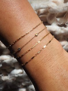 Designed with mixed square and rectangular links, the Dayna Bracelet will add a unique texture to your stack. Designed as part of our BBT Luxe collection, you'll never have to take this bracelet off, as we pride ourselves on fine jewelry without any of the markups. 14k Solid Gold Length: 6" + 1" Extender Width: 2 mm Pieces from this collection are not eligible for any discounts or promotions Dainty Everyday Stackable Bracelets, Dainty Stackable Bracelets For Everyday, Fine Jewelry Bracelets With Tarnish Resistant Rectangular Links, Minimalist Stackable Jewelry With Rectangular Links, Modern Stackable Jewelry With Rectangular Links, Modern Luxury Stackable Bracelets, 14k Gold Bracelets With Rectangular Links, Classic Stackable Jewelry With Rectangular Links, Dainty Adjustable Bracelet With Solid Link