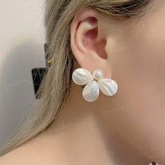 Dainty white flower pearl stud earrings, this pearl earring can be used as a reward for yourself or as a gift for a friend. Perfect gifts for happy birthday, New Year, Valentine's Day, Mother's Day, Thanksgiving Day, Chrism. ✨Product Details 𖧹 Base Metal: Sterling Silver (S925) 𖧹 Pearl Size: 10mm 𖧹 Gemstone: Mother Of Pearl 𖧹 Two studios (New York and Florida): Handcrafted in NY Studio  ✨Our jewelry is packaged in an ornament box or envelope. To avoid waste, usually more than one item will b White Flower Pearl Earrings For Anniversary, Pearl White Flower Drop Earrings, White Flower-shaped Pearl Earrings For Anniversary, Pearl White Flower-shaped Earrings For Party, White Pearl Drop Flower Earrings For Party, White Pearl Earrings In Flower Shape, Pearl White Flower Earrings, White Pearl Drop Flower Earrings, Pearl White Flower Earrings For Formal Occasions