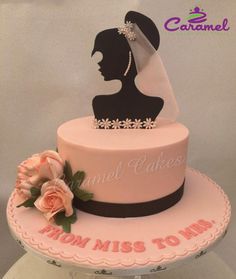 a wedding cake with a bride's silhouette on top