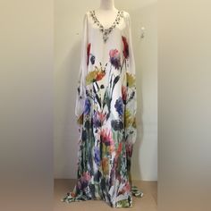 Badgley Mischka Beaded White Multi Brushstroke Watercolor Floral Caftan Dress Size Xs Nwt Kimono Sleeve, V-Neck Floral Print, Double Lining, Bead, Sequin, And Rhinestone Detail Pullover Body: 100% Silk Lining: Polyester Imported Spot Clean Includes Extra Beads Embellished Silk Maxi Kaftan, Embellished Silk Maxi-length Kaftan, Embellished Silk Bohemian Kaftan, Bohemian Embellished Silk Kaftan, Sequin V-neck Wedding Kaftan, Embellished V-neck Kaftan For Wedding, Flowy V-neck Embellished Dress, Elegant Embellished Multicolor Kaftan, Elegant Embellished Kaftan For Vacation