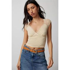 Embrace the summer with elegance and a touch of vintage charm in our Vintage Lace V-Neck Crop Top. Perfect for those sunny days out or a casual evening rendezvous, this top combines comfort with a chic design to enhance your wardrobe. Its delicate lace detailing and flattering V-neck cut ensure you stand out in style, making it a versatile addition to any fashion-forward closet. Key Features Soft and breathable polyester broadcloth fabric Charming lace decoration for a feminine touch Classic short sleeves and a sleek, slim fit design Comfortable slight stretch material for easy movement Elegant solid pattern and a stylish V-neck collar Product Benefits Perfect for any summer occasion: Whether it's a day at the beach, a night out, or daily wear, this top suits all your summer needs. True to Ruffled Crop Top, Broadcloth Fabric, Flowy Maxi Skirts, Stylish Skirts, Vintage Crop Tops, Lace Decor, Casual Evening, Cropped Tops, Neck Crop Top