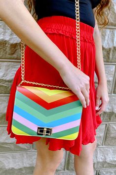 Details: Rainbow Color Crossbody Bag - Multi color- Crossbody Content: Polyurethane,Mixed MetalSize + Fit: Measurements: 8"W x 5"H x 2.5"D Cheap Multicolor Crossbody Shoulder Bag, Rainbow Purses, Multi Colored Bag, Painted Bags, Hair Accessories Gift, Rainbow Color, Crop Top Blouse, Custom Bags, Beautiful Bags