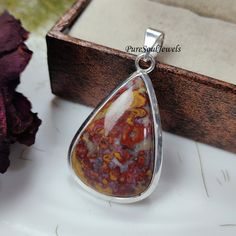 Plum Root Agate Pendant, 925Sterling Silver Pendant, Gemstone Pendant, Agate Handmade Jewelry, Birthday Day Gift, Women's Jewelry, Gift Idea Gemstone Pendant Gemstone- Plum Root Agate  Stone Type- Natural Polish- Silver  Metal- 925 Sterling Silver Pendant Size- 25x45 MM Weight- 7.90 Gram Theme- Love & Friendship Style- Boho & Hippie Product Status: Ready to Ship You can also have a look on our other amazing products here- PureSoulJewels:- https://www.etsy.com/shop/PureSoulJewels?ref=seller-platf Gift Jewelry Agate Stamped 925, Handmade Sterling Silver Gemstones For Anniversary, Stamped 925 Agate Jewelry For Gift, Sterling Silver Gemstones With Natural Stones For Anniversary, Anniversary Sterling Silver Gemstones With Natural Stones, Hallmarked Agate Jewelry For Anniversary, Anniversary Agate Jewelry Hallmarked, Unique Agate Gemstones For Gift, Sterling Silver Teardrop Gemstones For Anniversary