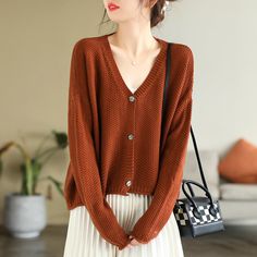 Details: Gender: Women Item Type: Cardigan Material: 100% Cotton Pattern Type: Solid Season: Spring, Autumn Style: Leisure, Daily, Retro Occasion: Going Out, Daily Size: One Size Length: 52.00 - 64.00 cm/ 20.47 - 25.20 " Bust: 130.00 cm/ 51.18 " Cuff: 22.00 cm/ 8.66 " Hem: 120.00 cm/ 47.24 " Brown Knitted V-neck Cardigan, Brown V-neck Cardigan For Spring, Trendy Brown V-neck Cardigan, Chic Brown V-neck Cardigan, Brown Long Sleeve V-neck Sweater For Spring, Casual Brown V-neck Sweater For Spring, Brown V-neck Cardigan For Work, Brown V-neck Knitted Cardigan, Brown V-neck Sweater