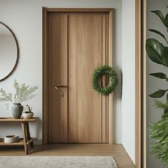 a wooden door with a wreath hanging on it's side next to a table