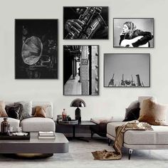 a living room filled with furniture and pictures on the wall