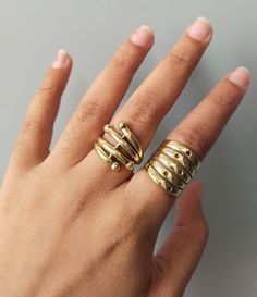 Horizontal Lines Ring, Shiny Brass Line Ring, Brass Wide Ring, Filigree Ring, Brass High Fashion Ring, Modern Ring, Multi Line Ring Size :- All Size Are Available METAL :- Brass ❥ Customers satisfaction is our biggest priority, please contact us with any questions/queries for future or existing orders, and we will do our best to make sure you are happy with your order. ♥ Please Make Sure to Include The Correct Address During Before Order. You Can return Item within 30 Days After Successful Delivery. We Offer 100% Money Back Guarantee If You Not Satisfied With Your Purchase. Return Charge Will Be Paid By Buyer Only. This is my shop link https://www.etsy.com/in-en/shop/AustereGifts?ref=seller-platform-mcnav Thank you🥰 for shopping with us! Fine Jewelry Open Wide Band Metal Ring, Stackable Yellow Gold Metal Rings, Adjustable Wide Band Yellow Gold Ring, Metal Stackable Open Rings For Anniversary, Stackable Metal Rings For Anniversary, Anniversary Stackable Metal Rings, Round Metal Wide Band Promise Ring, Wide Band Stackable Rings As Gift, Tarnish Resistant Open Metal Ring