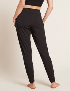 PRODUCT DETAILS THE DOWNTIME LOUNGE PANT – DRAPED FIT WITH A TAPERED LEG Stretchy, stylish and sustainable, our Downtime Lounge Pants are your new weekend companion and will take you from your couch to your favorite cafe in comfort. With their wide waistband, premium Storm color and heavyweight feel, these women's lounge pants exude luxury. In a gently-snug, draped fit, these gorgeous pants feature a tapered leg with comfortable, fitted ankle cuffs and pleating below the waistband. No plans for Bamboo Clothes, Active Tights, Kitchen Clothes, Lounge Pants Womens, Lounge Top, Weekend Wear, Skirted Swimwear, Wide Waistband, Summer Hats