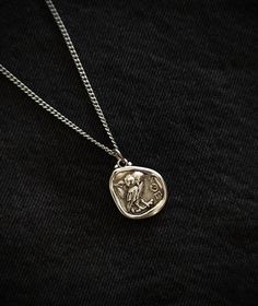 This necklace is composed of an ancient greek spinner coin pendant in silver filled brass, a  durable and fashionable piece that compliments any outfit. Perfect gift for him! The pendant is also double sided as seen in the pictures. About the coin: The owl represents prosperity and pride of Ancient Greece. It also is the emblem of the city of Athens. Above all, it was the first widely recognized international coin in classical antiquity. This historical coin depicts the helmeted head of Athena o Necklaces For Him, Necklace Men’s, Pendent For Men, Patron Deity, Owl Of Athena, Historical Coins, Greek Mythology Jewelry, Pendant Necklace Men, Mythology Jewelry