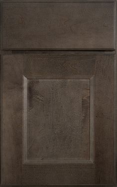 an image of a kitchen cabinet door with wood grain pattern on the front and sides