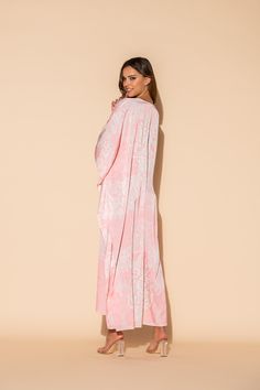 This damask print is a lovely combination of pale pink and white in our Romantique long caftan. The long, flowing caftan is made out of our signature Polysilk fabric for that all-day luxe vibe. Cover-up? Sure. Loungewear? Why not? Brunch with friends? Definitely. Sleepwear? Absolutely. Machine washable for ease of care. Elegant White Kaftan For Daywear, Elegant Spring Kaftan For Loungewear, Elegant Pink V-neck Kimono, Elegant Maxi Length Kimono For Loungewear, Elegant Maxi-length Kimono For Loungewear, Elegant Loungewear Kimono Maxi Length, Elegant Long Kaftan For Daywear, Elegant Maxi Length Daywear Kaftan, Elegant Maxi Length Kaftan For Loungewear