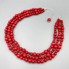 "This a beautiful Red Turquoise Chunky Necklace is completely handmade with high quality. This gorgeous Red Turquoise Chunky Necklace goes with everything and everywhere, holiday party or after work with friends! The Necklace made from Red Turquoise beads, 16\" short layer and 18\" long layer with 3 inch extender chain for adjustment, and has light weight. Stone meaning Turquoise is perhaps the oldest stone in man's history, the talisman of kings, shamans, and warriors. Red Turquoise is a stone Gift Jewelry With Wooden Beads And Red Coral, Multi-strand Red Coral Beaded Necklace As Gift, Multi-strand Red Coral Beaded Necklace For Gift, Red Multi-strand Necklace With Wooden Beads, Multi-strand Necklace With Red Wooden Beads, Multi-strand Red Necklace With Wooden Beads, Handmade Red Beaded Necklace For Christmas, Red Coral Beaded Necklace With Wooden Beads, Red Wooden Beads For Gift