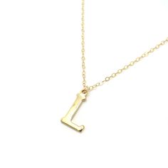 "Make it personal with this gold initial necklace! This makes a great gift for a friend, baby's initial, or present for yourself! Shop Landon Lacey Jewelry » www.etsy.com/shop/landonlacey it's in the DETAILS . . . » 14k gold filled chain » Gold plated initial pendant with anti-tarnish finish » Spring ring clasp » The model is wearing this necklace at 18\", she is petite and this could sit shorter or longer depending on body type. it's in the OPTIONS . . . » Select your length at checkout. I reco Gold Monogram Initial Pendant Necklace, Gold Minimalist Initial Necklace, Gold Initial Pendant Necklace With Custom Name, Gold Initial Necklace With Custom Name, Gold Personalized Initial Necklace For Mother's Day, Custom Name Initial Pendant Necklace In Gold, Mother's Day Personalized Gold Initial Necklace, Gold Initial Pendant Name Necklace For Mother's Day, Gold Monogram Charm Necklaces For Mother's Day