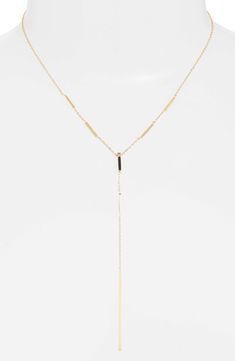 Solid bars add dimension to this golden chain Y-necklace anchored with a slender pendant. 15" length; 7" drop Stainless steel Imported Chic Long Drop Gold Necklace, Chic Long Drop Necklace With Delicate Chain, Minimalist Gold-tone Lariat Necklace With Adjustable Chain, Gold-tone Minimalist Lariat Necklace With Adjustable Chain, Gold Long Drop Necklace With Adjustable Length, Gold Y-shape Necklace With Delicate Chain, Dainty Gold-tone Lariat Necklace With Clavicle Chain, Minimalist Gold-tone Lariat Necklace With Delicate Chain, Gold Y-shape Delicate Chain Necklace