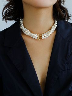 Our Multilayer Steamed Bun Pearl Necklace: a luxurious, timeless, and elegant piece featuring 18K gold plating and selected flat oval freshwater pearls. Add a touch of sophistication to your look with a comfortable 40cm length and dynamic multilayer design. Elevate your style with this perfect fusion of craftsmanship and natural beauty. Metal: 18K Recycled Gold Plated On Brass Pearl: Freshwater Pearl 6-7mm Necklace length 400mm Weight:73g Edison Pearls, Steamed Buns, Pearl Necklaces, Tiger Eye Stone, Recycled Gold, Necklace Length, Multi Layering, Gold Plating, Fresh Water