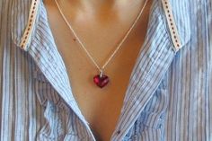 Full of Sparkles, Heart Shaped Red Cubic Zirconia suspended on Sterling Silver 18" length chain. Only one piece made for that special someone! Wrapped in Belesas Branded Box ready for gift giving.(n201)The lovely heart measure 15mm x 12mm*LIKE* us on Facebook http://www.facebook.com/Belesas to find special coupon codes,*FOLLOW* us on Twitter https://twitter.com/#!/Belesas to get more exclusive coupon codes*All item are ready to ship! Free shipping on orders over $150 using coupon code BELESAS150 Red Heart Necklace With Birthstone For Gift, Red Heart Necklace With Birthstone As Gift, Red Heart Birthstone Necklace Gift, Red Birthstone Heart Necklace For Gift, Personalized Red Heart Cut Necklace, Red Crystal Necklace For Valentine's Day, Red Birthstone Necklaces For Anniversary Gifts, Red Heart Cut Necklace For Wedding, Red Heart Charm Necklace For Wedding