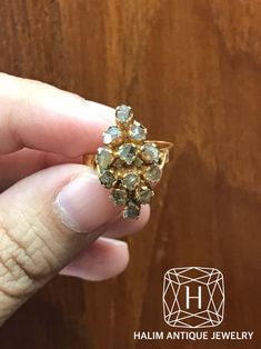 Antique Polki Diamond Ring. It's antique ring crafted by hand over 60 years old. - Polki Diamond - Material : gold - Total Wt. : 2.8 g. - Size : 5 us Please contact us if you want to adjust the ring size. Can adjust the ring size for free 1-2 size It takes about 5-10 days to adjust the size. **Ship with DHL insured according to product value for free.** *Please contact us if you have any questions.* ABOUT PERANAKAN JEWELRY Peranakan jewelry is rare and skilfully crafted traditional gold providing a pedestal for Diamond and other precious stones to be mounted on. Each crafted piece holds the mystery of the individual who owns it and embraces an era in Baba history. Peranakan jewelry is fashioned with influences from the Malay Archipelago, Asia, China, Europe, Anglo-Indian, and Victorian Eng Malay Archipelago, Antique Ring, Victorian Rings, Ring Crafts, Style Change, Valentines Jewelry, Diamond Cluster Ring, Engraved Rings, Antique Rings