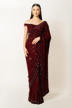 Ox blood georgette saree with sequins hand embroidery. Comes with a off-shoulder blouse.
Components: 2
Pattern: Hand embroidered
Type Of Work: Sequins
Neckline: Off Shoulder
Sleeve Type: Sleeveless
Fabric: Georgette
Color: Red
Other Details: 
Closure: Blouse - Back hooks
Occasion: Wedding - Aza Fashions Long Sleeve Saree Blouse, Aesthetic Saree, Red Saree, Blouse For Women, Georgette Saree, Work Sarees, Blood Red, Saree With Blouse, Georgette Sarees