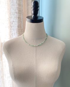 Enjoy the soft glowing colors of this chrysoprase beaded necklace. Small micro-faceted chrysoprase beads are hand-strung to create this simple yet eye-catching necklace. These petite gems display varying shades of green, creating an earthy elegance. Chrysoprase is an alternative birthstone for May. Designed as a part of our Birthstone Bar Collection, all of our birthstone charms will slip easily onto this slim necklace, allowing you to create your own unique piece. Add your birthstone or those o Single Strand Amazonite Spiritual Beaded Necklace, May Birthstone Beaded Necklaces With Round Beads, Dainty Green Gemstone Beaded Necklaces, Handmade Adjustable Green Emerald Necklace, Green Dainty Jewelry With Faceted Beads, Jade Emerald Necklace With Round Beads For Healing, Aventurine Gemstone Beads Necklace For Healing, Green Spiritual Jewelry With Tiny Beads, Beaded Green Onyx Round Beads Necklace