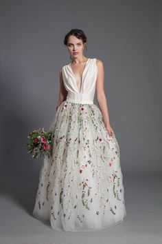 High-quality ecru (off white) lace and tulle maxi skirt MADE TO ORDER. Made of soft tulle and floral embroidery fabric. The skirt has hidden zipper on the side. Perfect as a part of wedding gown for a bride. The skirt will be sewn to your measurments. Maximum length 110 cm. We offer silk bodysuit shown on the picture separately. SIZES: Size XS - Length 110 cm, waist 70 cm Size S - Length 110 cm, waist 74cm Size M - Length 110 cm, waist 78 cm Size L - Length 110 cm , waist 82 cm Size XL - Length Wedding Maxi Dress With Voluminous Skirt, Embroidered Flowy Wedding Skirt, White Floral Embroidered Skirt For Wedding, White Floral Embroidery Skirt For Wedding, White Floral Embroidered Wedding Skirt, Embroidered Full Skirt For Wedding, Spring Wedding Skirt With Floral Embroidery, Long Wedding Skirt With Floral Embroidery, Wedding Long Skirt With Floral Embroidery