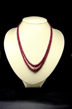 100 % Natural Ruby smooth rondelle shape beaded necklace with adjustable silk cord closure. Details: - Gemstone: Natural Ruby Calibration of beads: From 3.00 millimeters To 6.50 millimeters approx Strand: 2 Gross weight: 212.00 carats Net weight: 185.00 carats Length Of Necklace: Inner 16.00 Inches till Outer 17.00 Inches approx SKU: RUBYBDS0031 100% NATURAL RUBY RONDELLE BEADS 100% GUARANTEED NATURAL RUBY NOT HEATED NOT TREATED NOT DYED PERFECT POLISHED BEADS NECKLACE FOR WOMEN WEAR Thank you f Faceted Ruby Round Bead Necklaces, Ruby Necklaces With Round Faceted Beads, Round Ruby Necklaces With Faceted Beads, Round Ruby Necklace With Faceted Beads, Ruby Rondelle Polished Beads Jewelry, Ruby Rondelle Jewelry With Polished Beads, Ruby Rondelle Beads For Jewelry Making, Elegant Gemstone Rondelle Beads, Elegant Rondelle Gemstone Beads