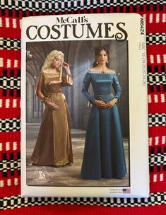 a magazine cover with two women in dresses