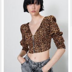 New With Tags Size: Small Zara Leopard Print Cheetah Print V-Neck Crop Top Long Sleeves Zip Up Bundle And Save Ships Same Day Or Next Business Day Use Invite Code Indyposhkristin To Join Poshmark And Receive $10 Off Your First Purchase. Fitted V-neck Brown Blouse, Leopard Print V-neck Tops For Night Out, Fitted Brown V-neck Crop Top, Fitted Brown V-neck Blouse, Brown V-neck Crop Top For Spring, Trendy Leopard Print V-neck Blouse, Zara Cropped Brown Top, Brown Cropped Blouse For Fall, Zara Trendy V-neck Crop Top