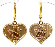 SoHo® Earrings brass gold plated Putte Angel Heart God bless you good luck charm bronze flower guardian angel The earrings are handmade in Germany. The metal is brass gold plated The trailers have a diameter of about 19 mm. Overall length: about 32 mm Brand: SoHo® Ths version is real gold plated Nickel-free Gold Heart Brass Earrings, Nickel Free Gold Brass Heart Earrings, Nickel-free Gold Brass Heart Earrings, Gold Nickel-free Dangle Heart Earrings, Vintage Gold Nickel-free Heart Earrings, Vintage Gold Heart Earrings Nickel Free, Gold Heart Dangle Earrings Nickel Free, Nickel-free Gold Heart Earrings In Brass, Gold Dangle Heart Earrings Nickel Free