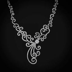 Shaftel Diamond Co. | For Sale on 1stDibs - 11.04 Carat round brilliant cut diamond swirl style necklace meticulously set in 18K white gold. Diamond quality: F-H color, VS2-SI1 clarity. Elegant Silver Spiral Jewelry, Elegant Spiral Sterling Silver Necklaces, Elegant Sterling Silver Spiral Necklace, Classic Spiral Jewelry For Formal Occasions, Elegant Silver Spiral Necklace, Elegant Spiral Jewelry For Formal Occasions, Spiral Cubic Zirconia Jewelry For Anniversary, Formal Spiral White Gold Jewelry, White Gold Spiral Jewelry For Formal Occasions