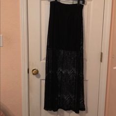 Never Worn! Great Condition! Beautiful To Dress Up Or Down. Black Relaxed Maxi Skirt For Night Out, Casual Black Maxi Skirt For Night Out, Black Lined Maxi Skirt For Night Out, Flowy Black Maxi Skirt For Day Out, Black Stretch Maxi Skirt For Date Night, Black Stretch Maxi Skirt For Day Out, Stretch Black Maxi Skirt For Day Out, Black Flowy Maxi Skirt For Date Night, Flowy Black Maxi Skirt For Date Night